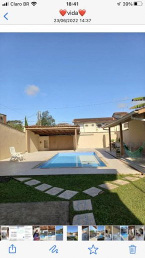 Casa com piscina a 50 mts da praia